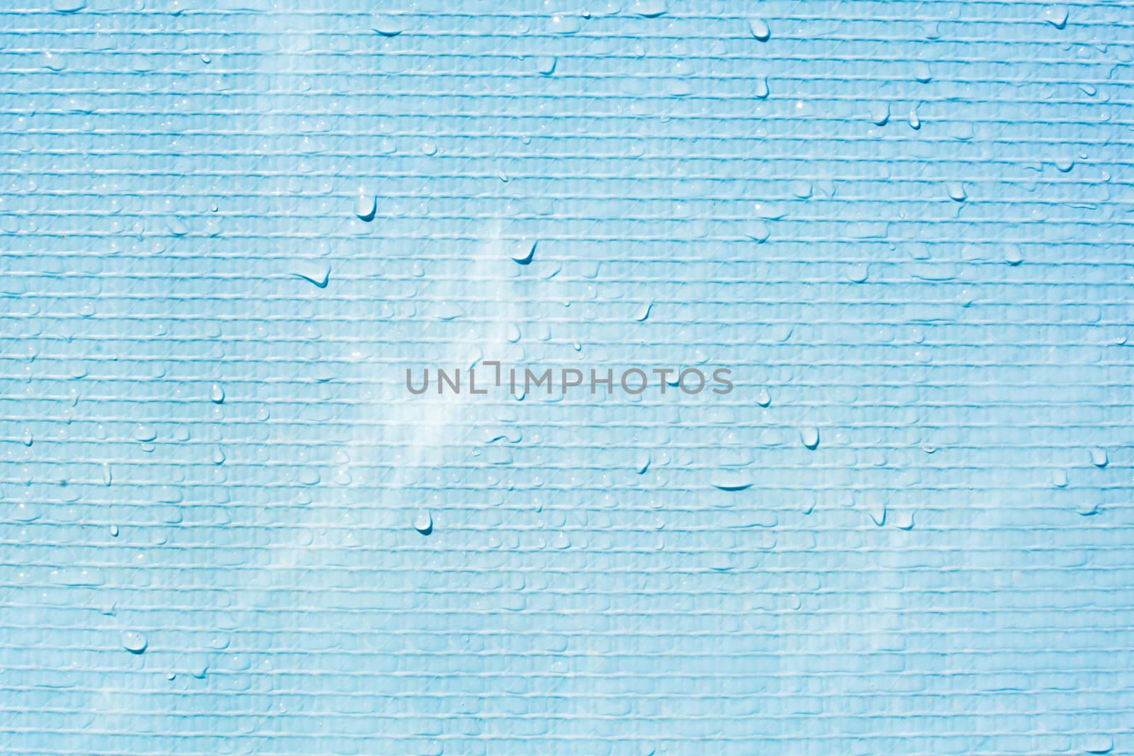 Blue background with water drops by chandlervid85