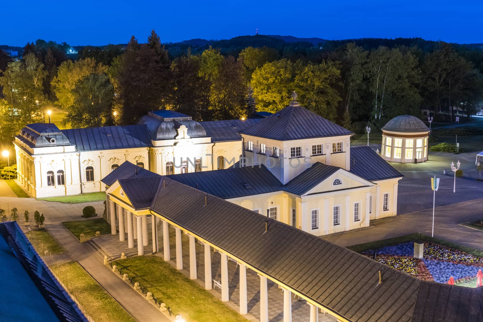 Frantisek Pavilion which houses Frantisek mineral spring and other spa and colonnade buildings from above are the most famous structures in Frantiskovy Lazne Spa town in the North Czech Republic. Seen from above at night