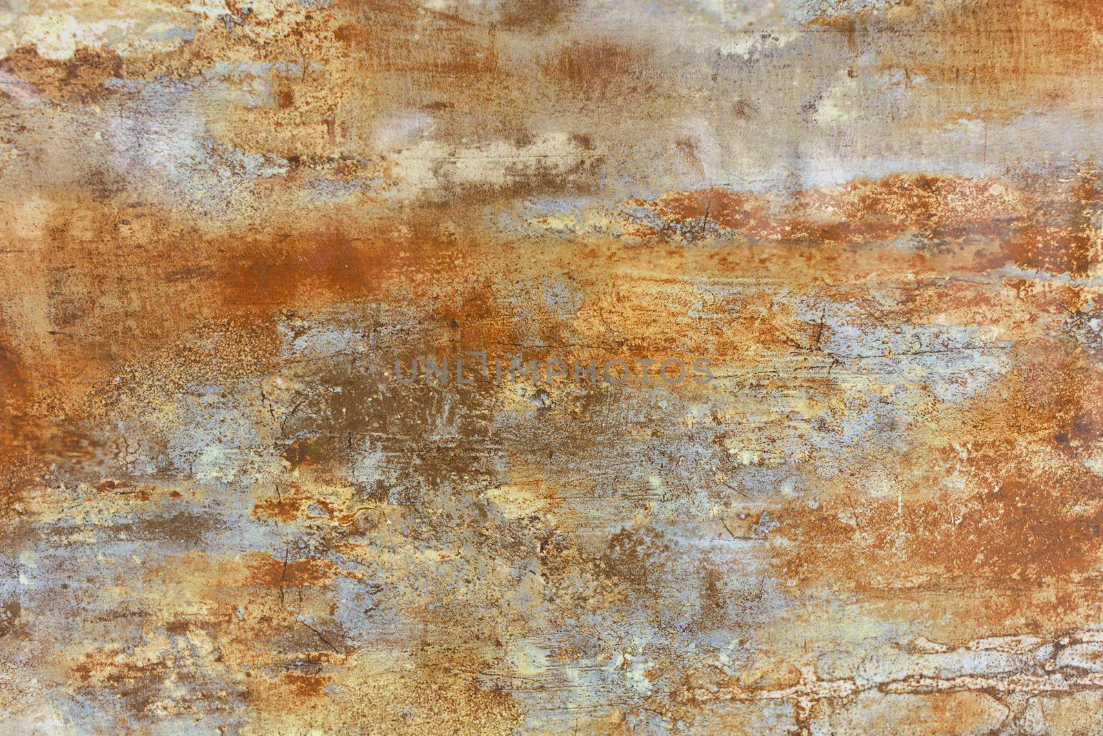 The surface, texture and background of a brown steel sheet of metal with beige rusty spots and patina. by Sergii