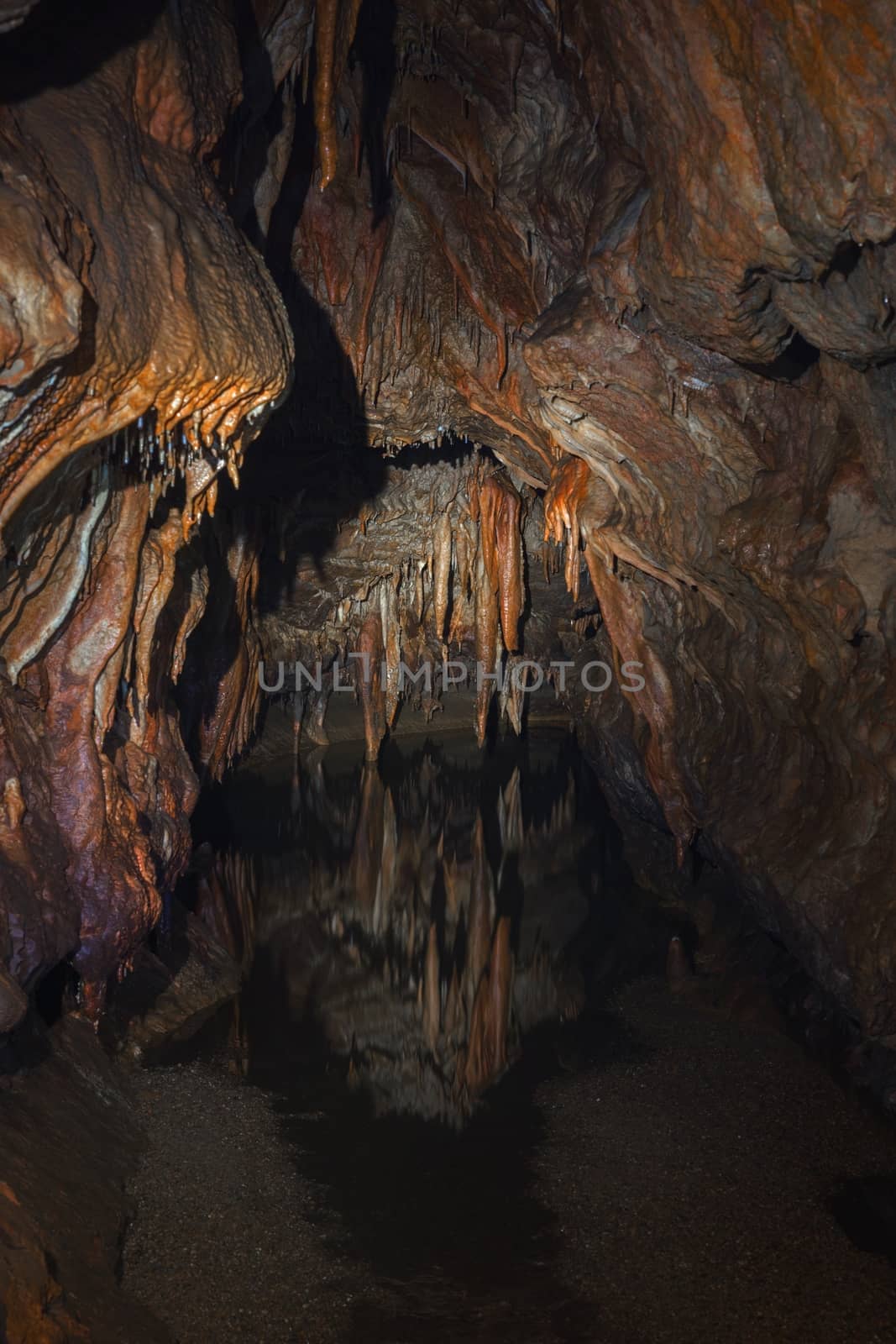 Underground lake sorrunded by rocks by svedoliver