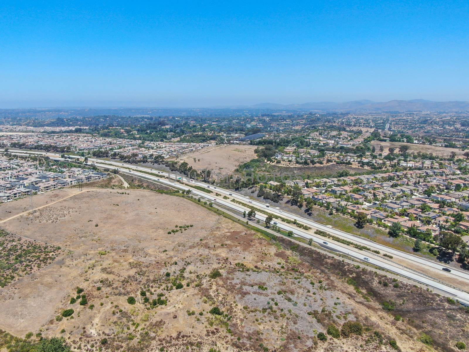 Aerial view of highway, freeway road with vehicle in movement in San Diego by Bonandbon