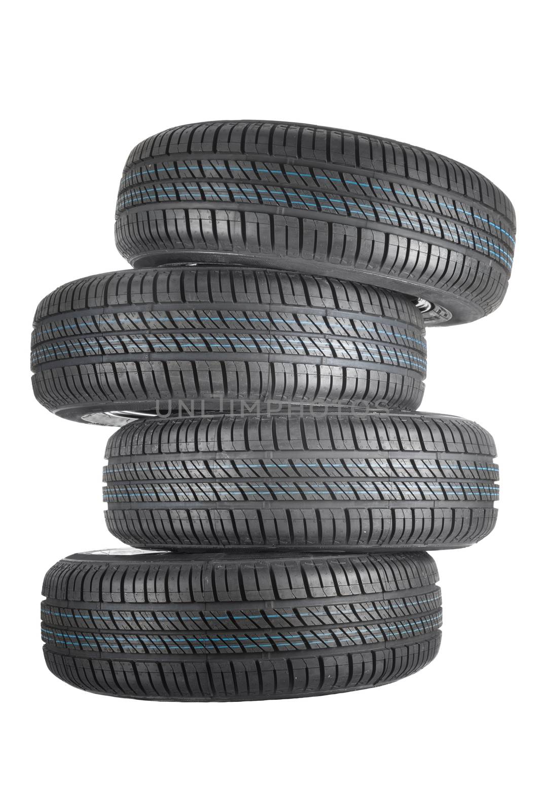 New and unused car tires against isolated background by svedoliver