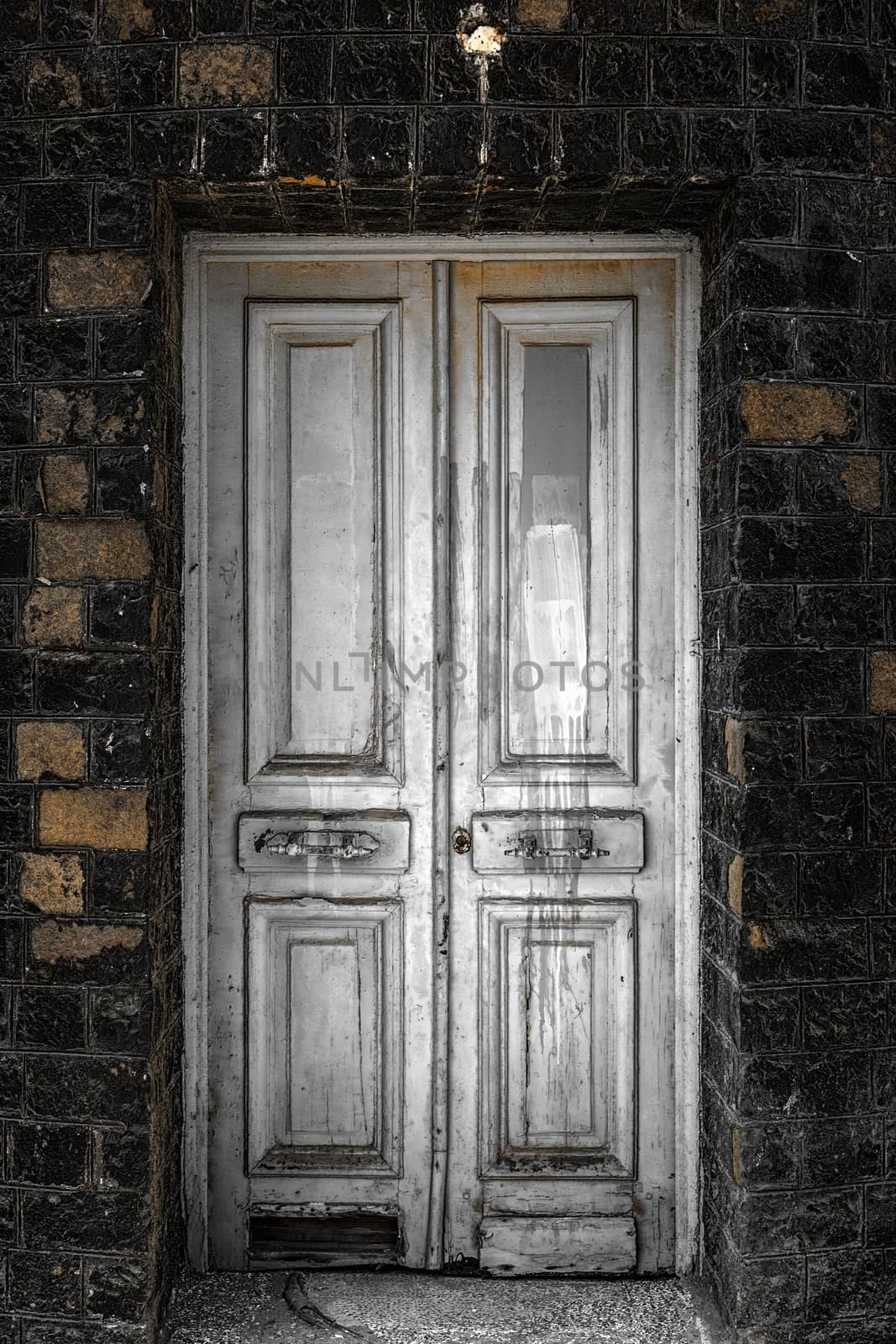 Old wooden door as background texture closeup