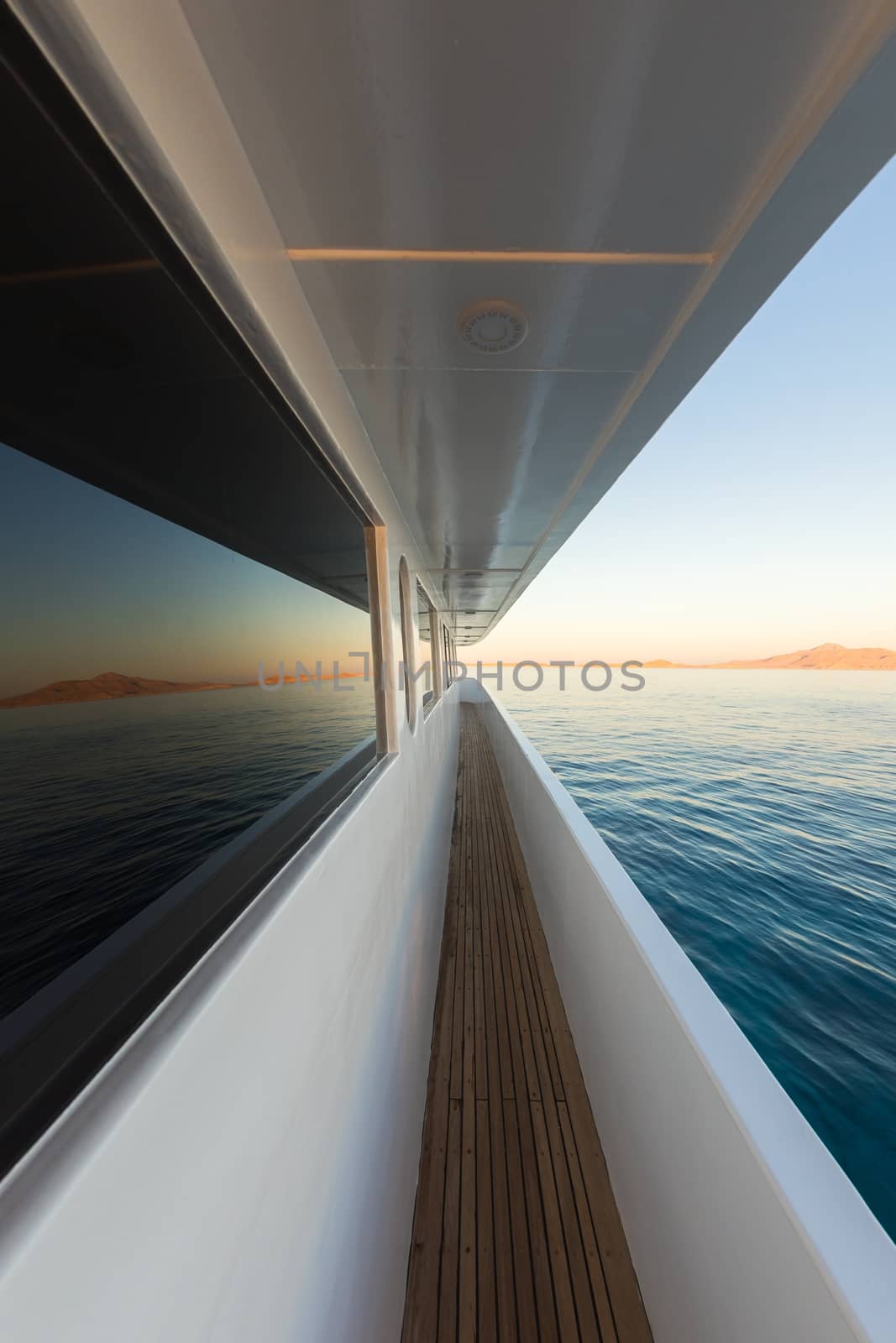 Corridor of luxury yacht with ocean and horizon