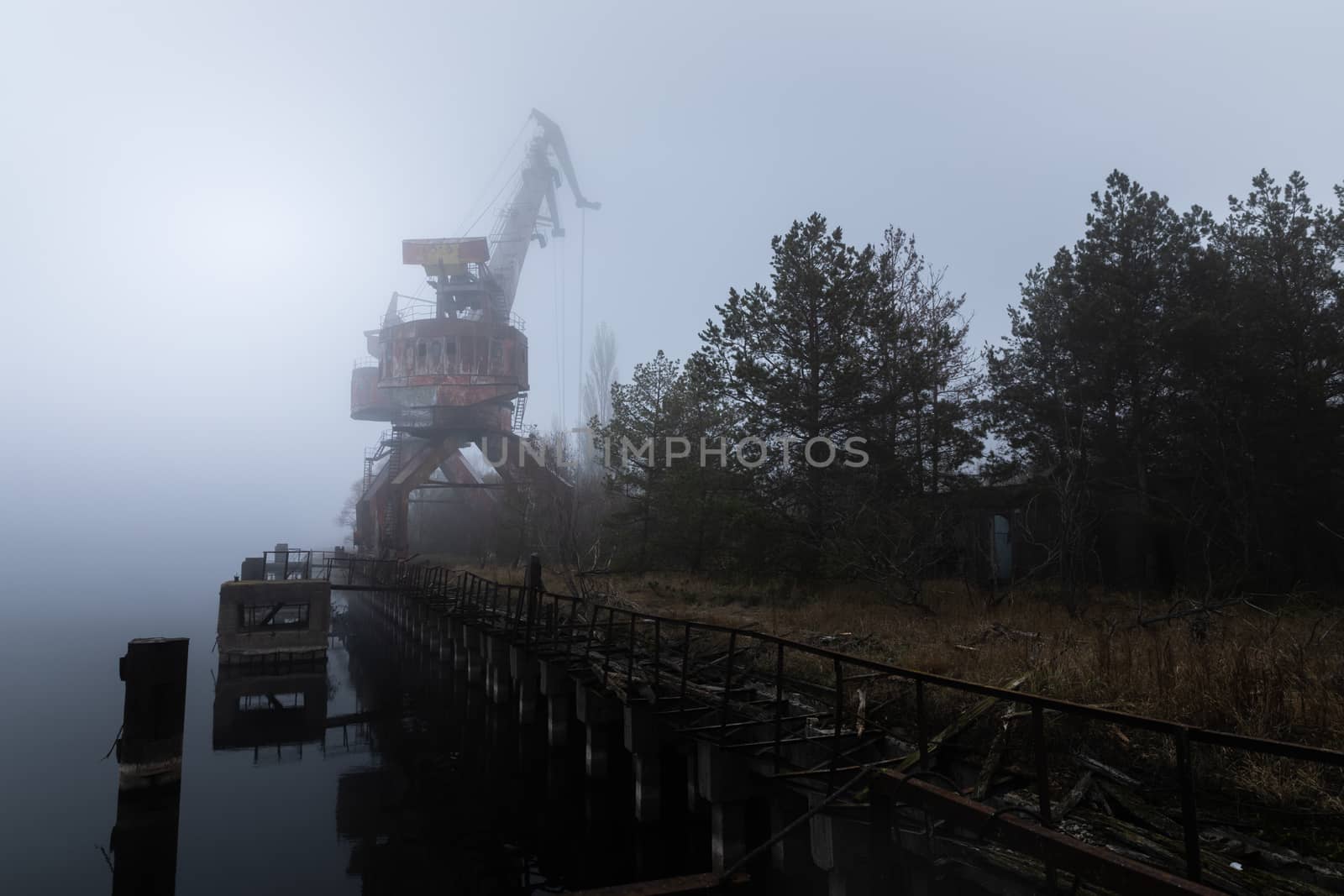 Rusty old industrial dock cranes at Chernobyl Dock