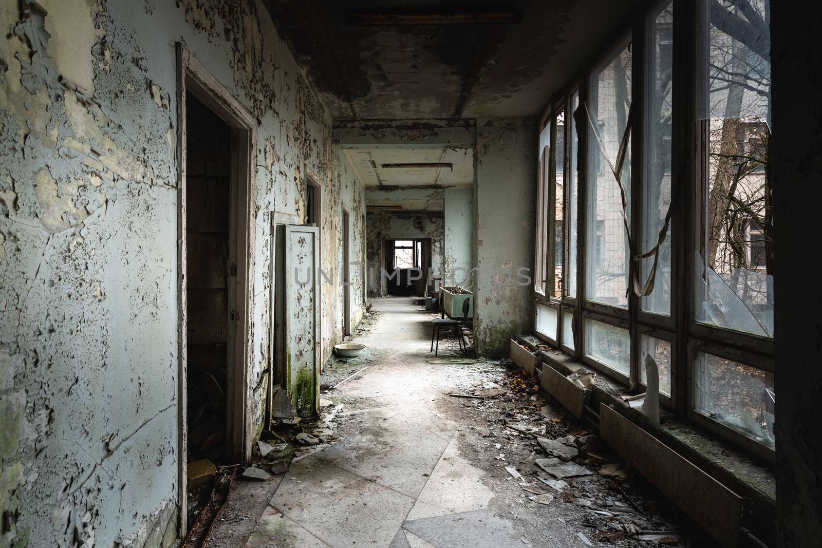 Abandoned corridor in Pripyat Hospital, Chernobyl Exclusion Zone 2019 angle shot