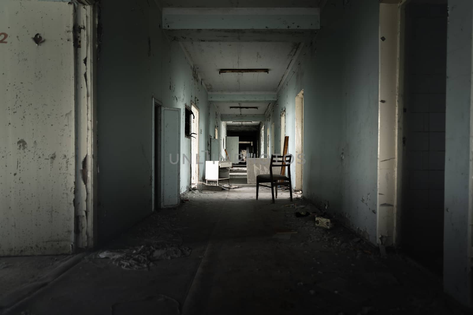 Abandoned corridor in Pripyat Hospital, Chernobyl Exclusion Zone 2019 angle shot