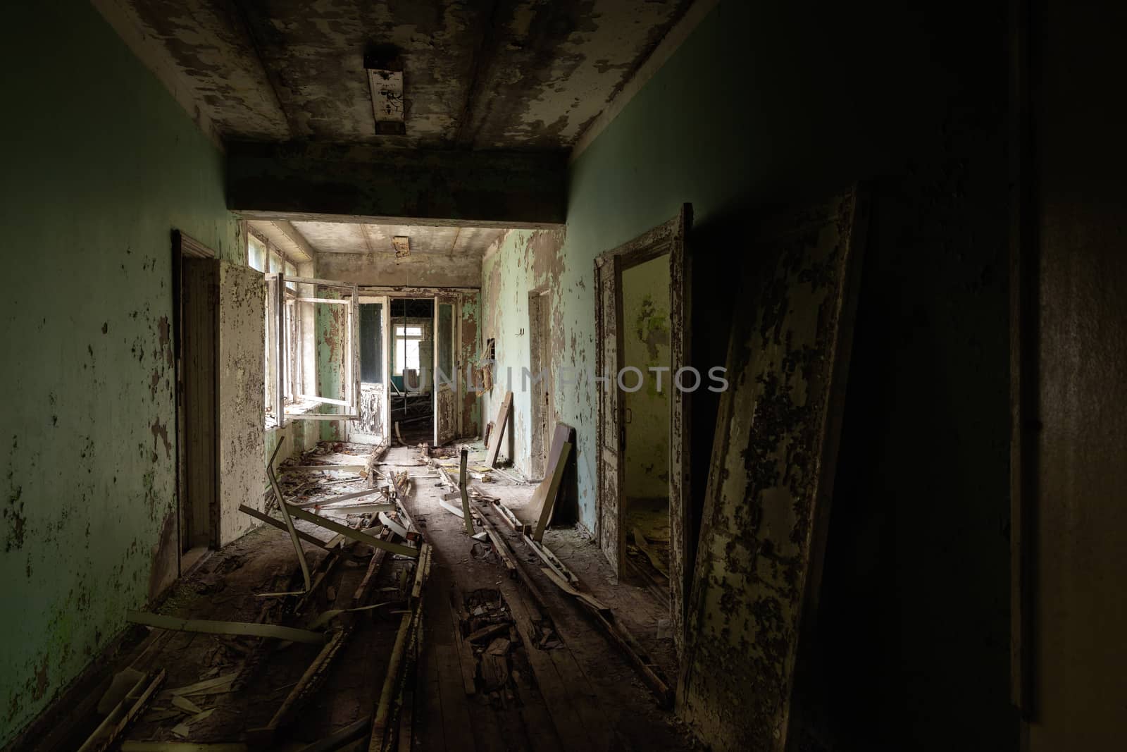 Abandoned corridor in Pripyat Hospital, Chernobyl Exclusion Zone 2019 angle shot