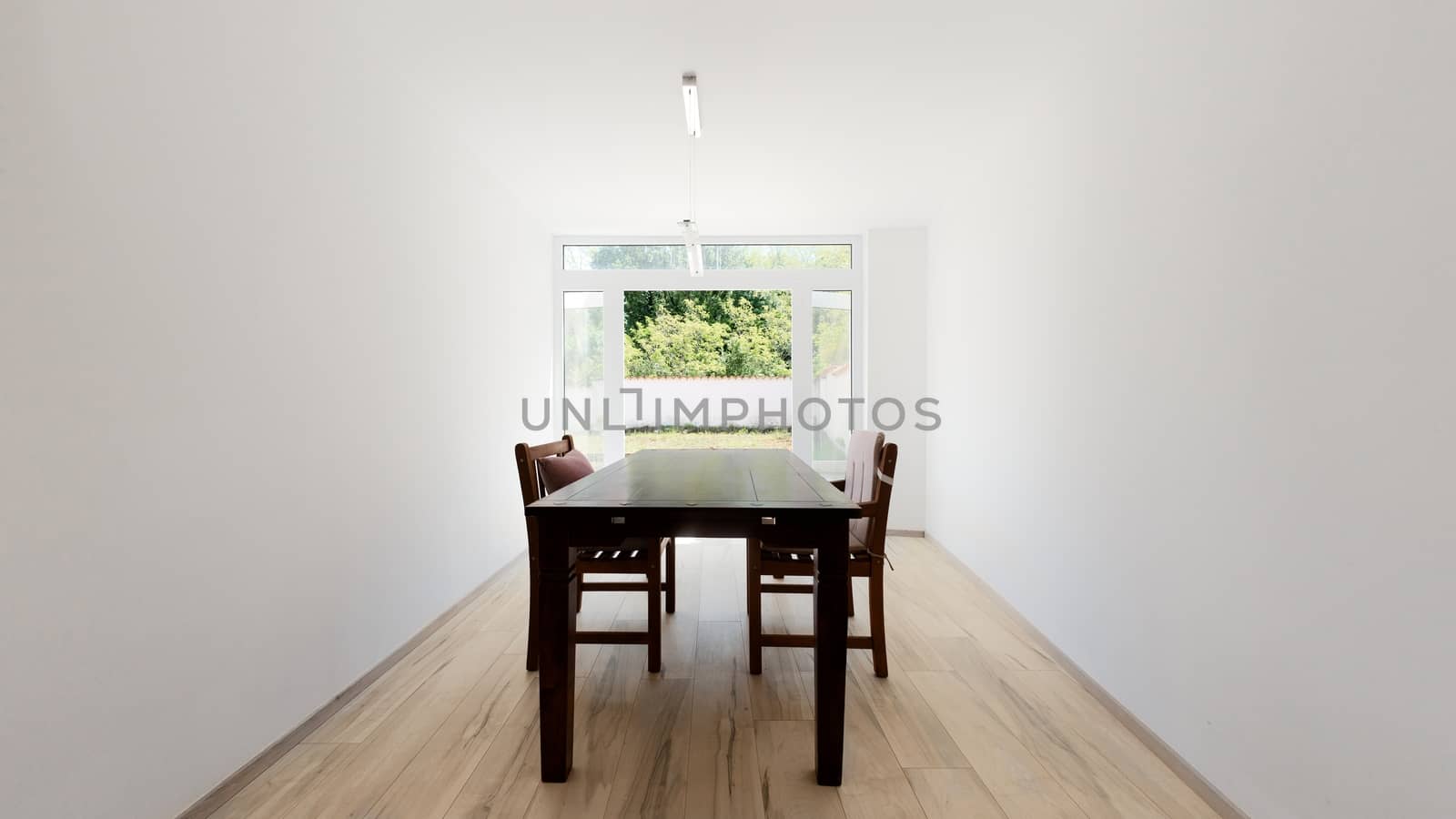 Dining table in large modern apartment angle shot