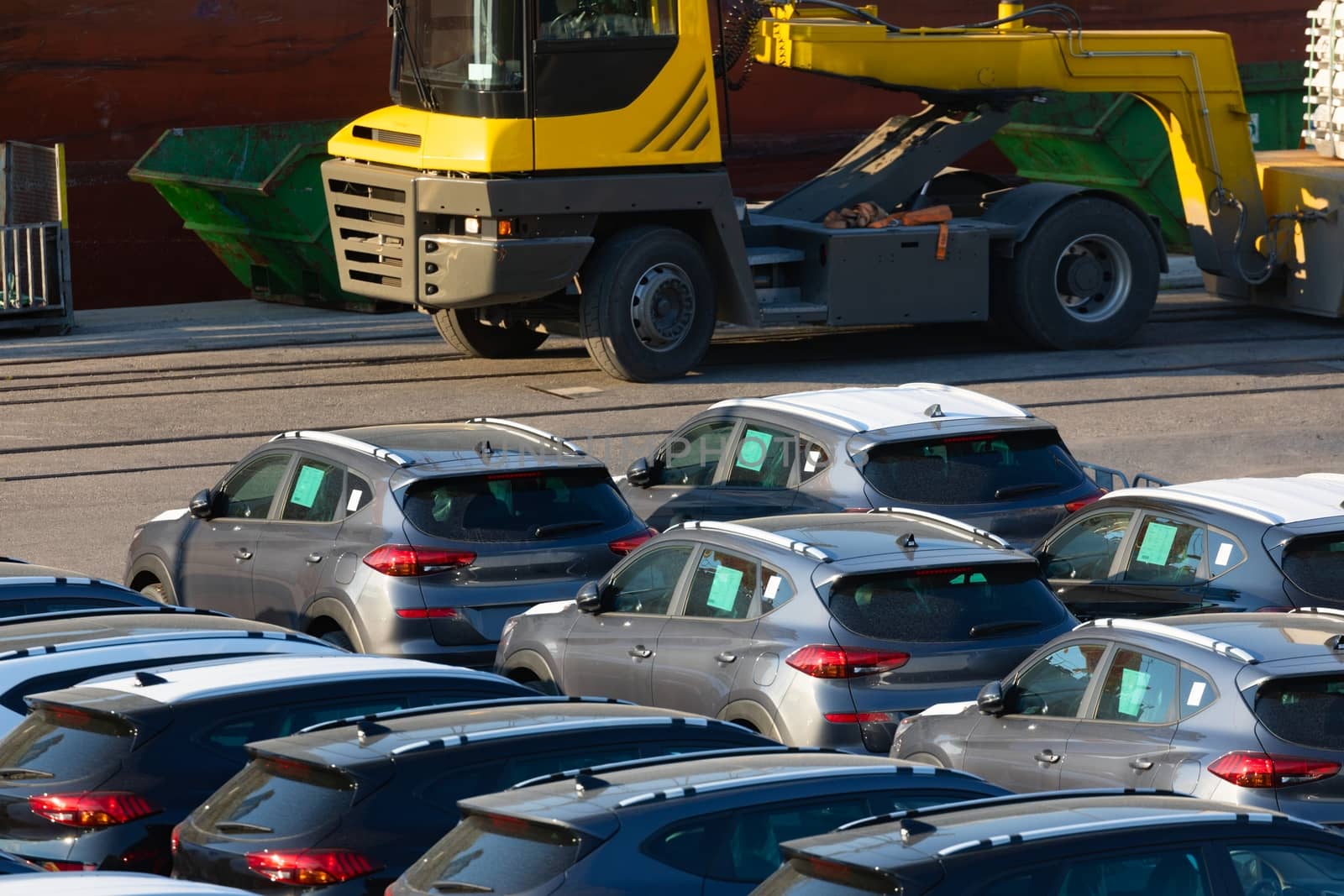 Lot of cars being transported to trade location by svedoliver