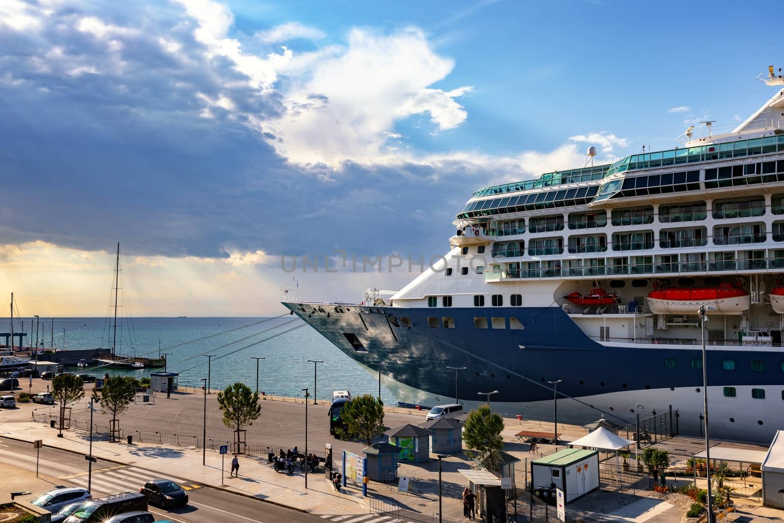 Large cruise ship anchored at the port by svedoliver
