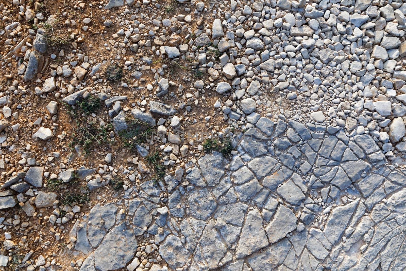 Rough stone surface as background texture closeup photo