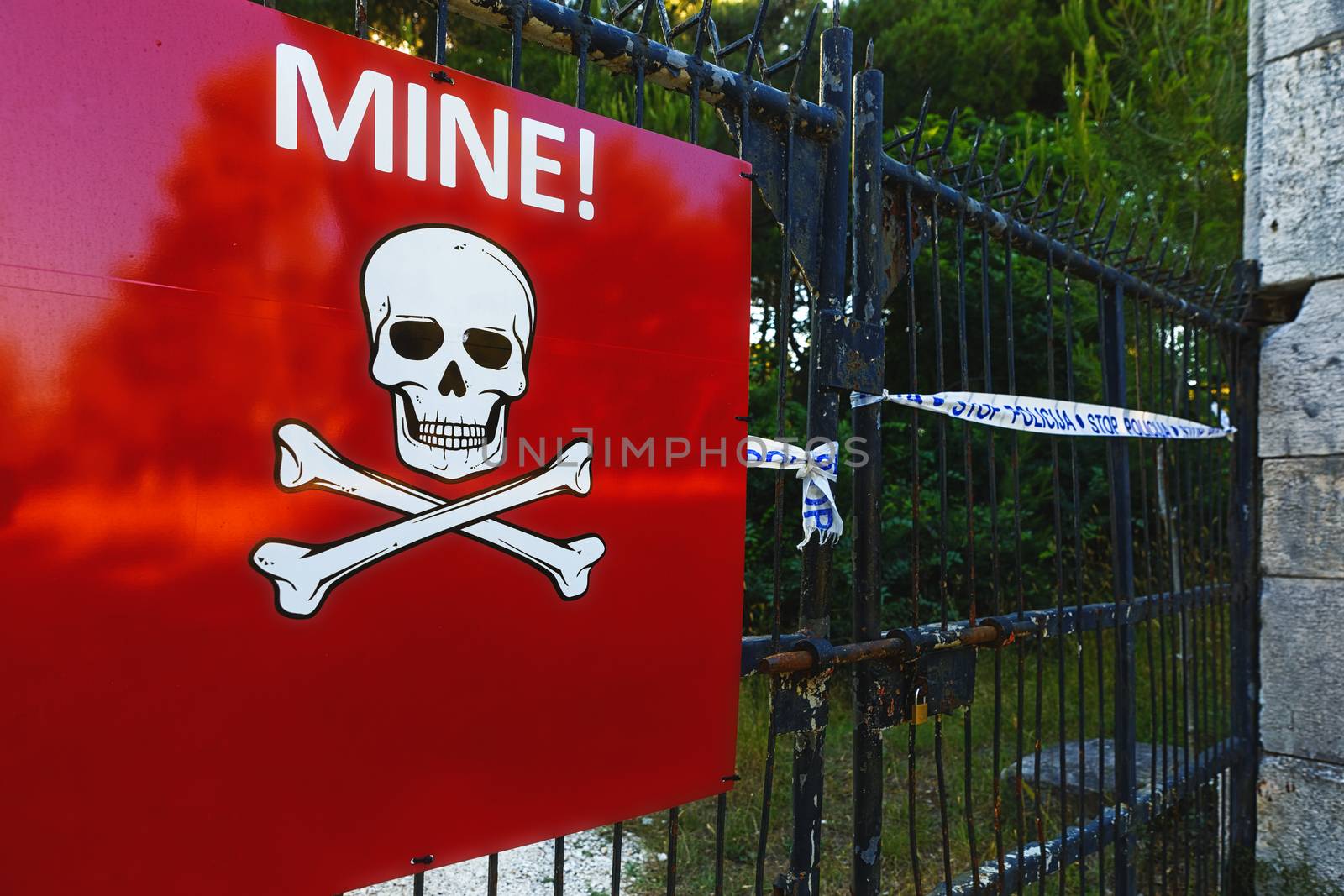 Beware of mines sign on closed territory by svedoliver