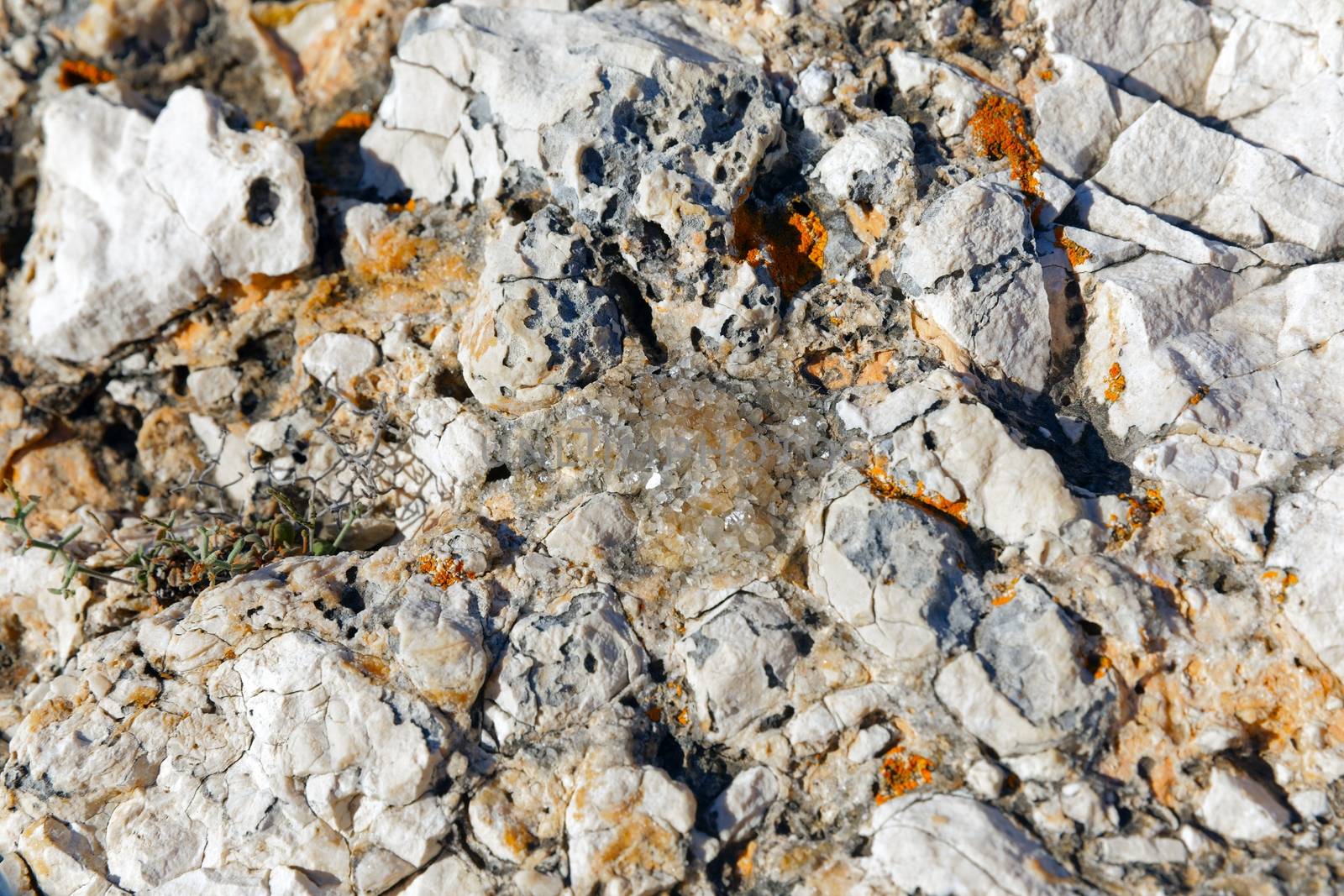 Rough stone surface as background texture closeup photo