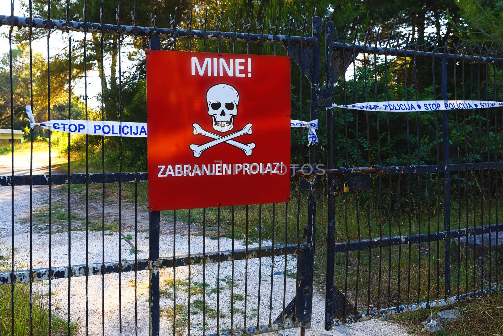 Beware of mines sign on closed territory by svedoliver