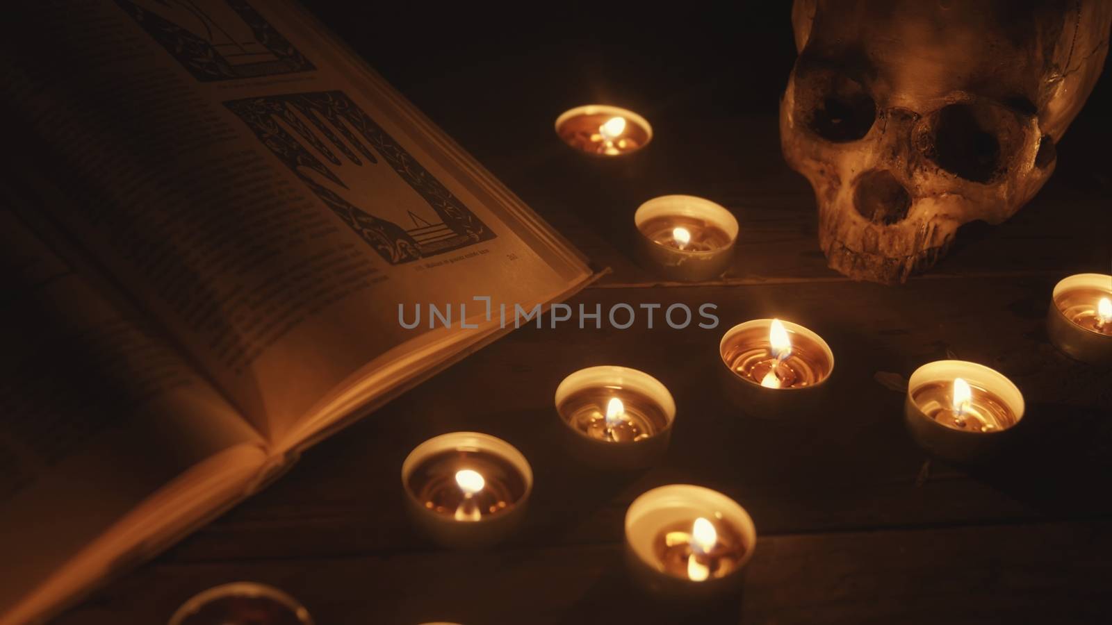 Altar with magical grimiore close up photo