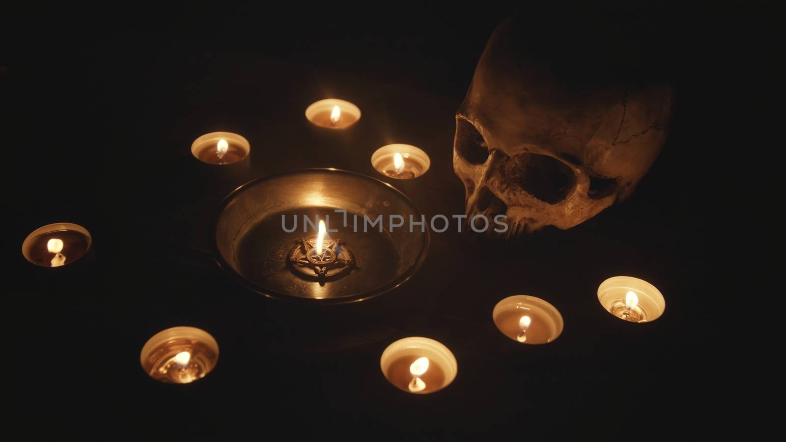 Burning pentacle on altar close up photo