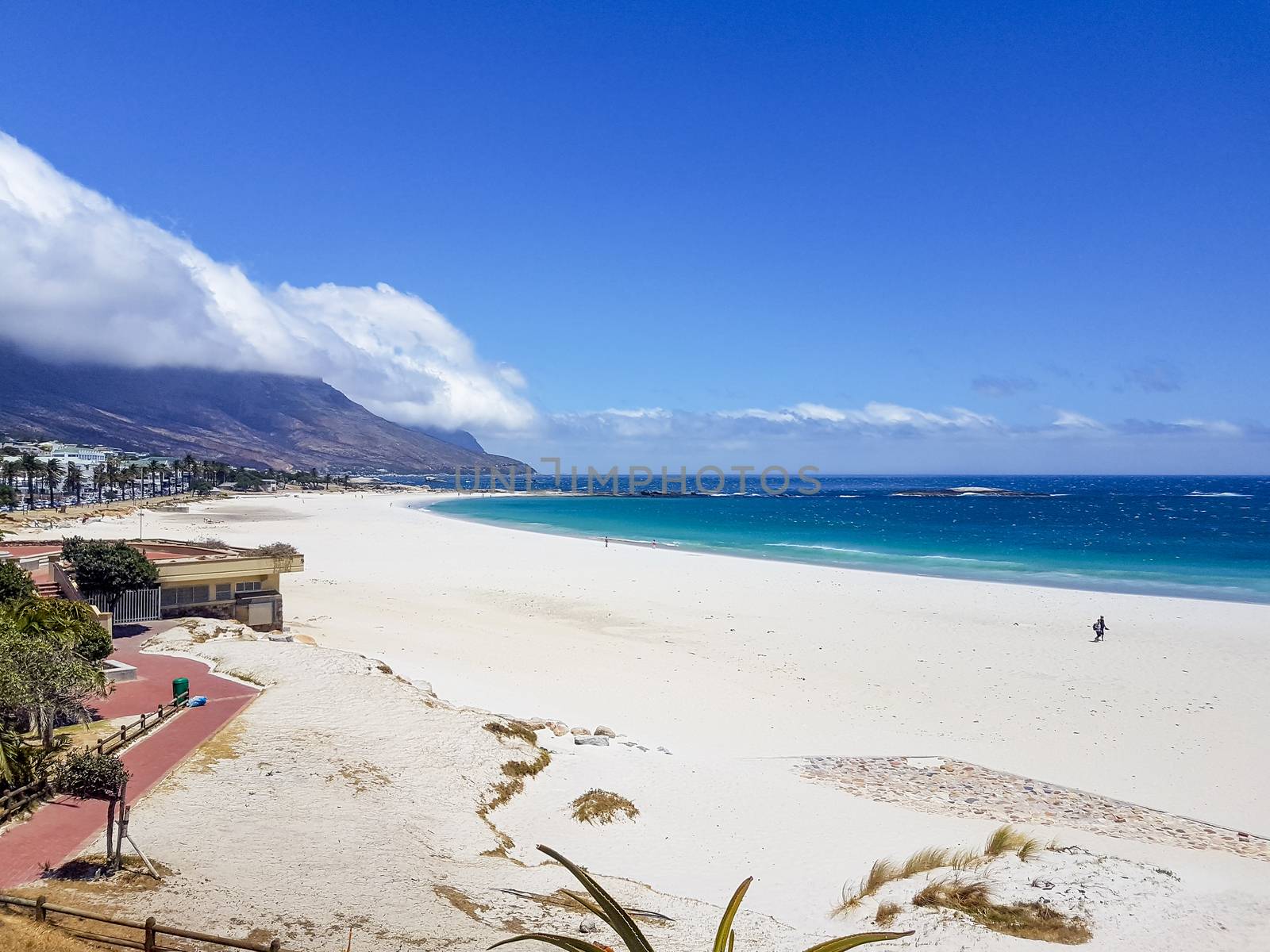 Camps Bay Beach and Table Mountain with clouds, Cape Town. by Arkadij