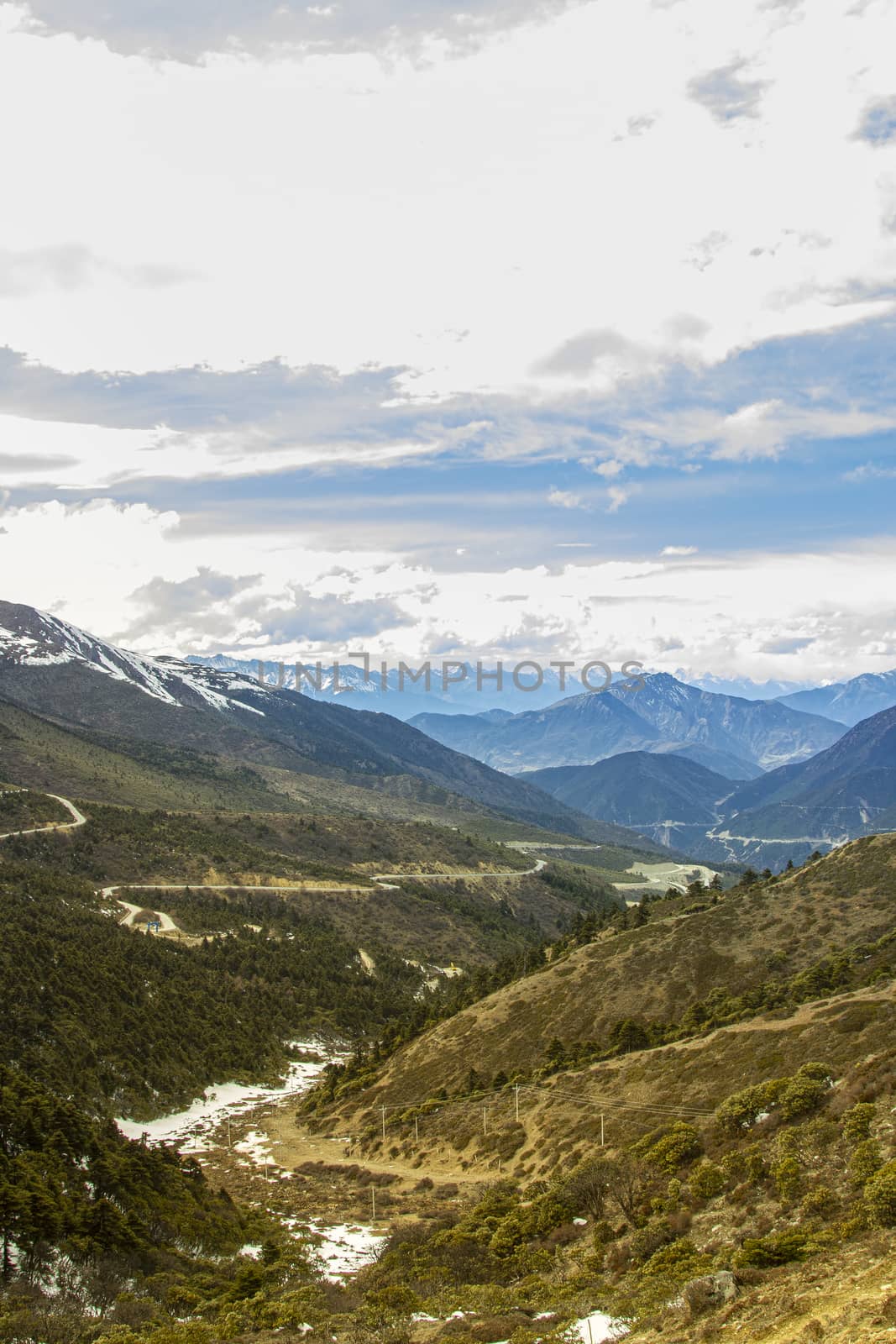 View of mountain landscape with clouds and sky