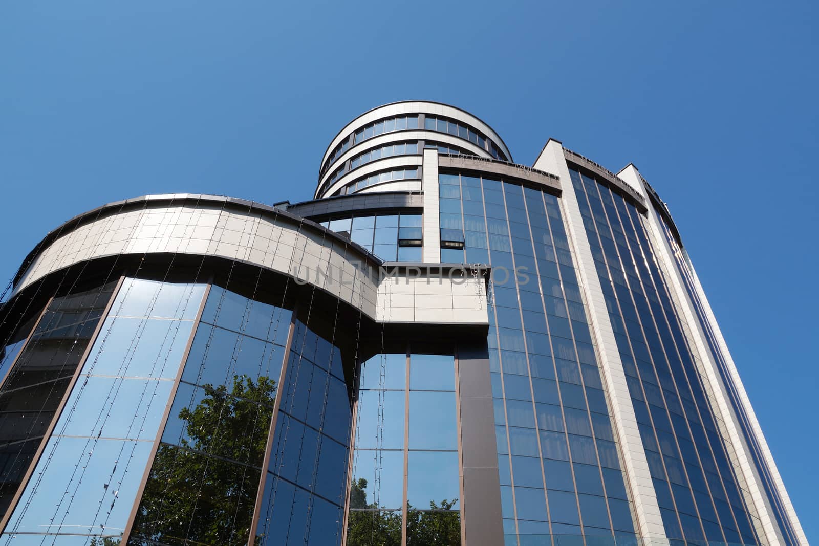 Varna,Bulgaria - August, 02, 2020: modern glass facade of a skyscraper against the sky