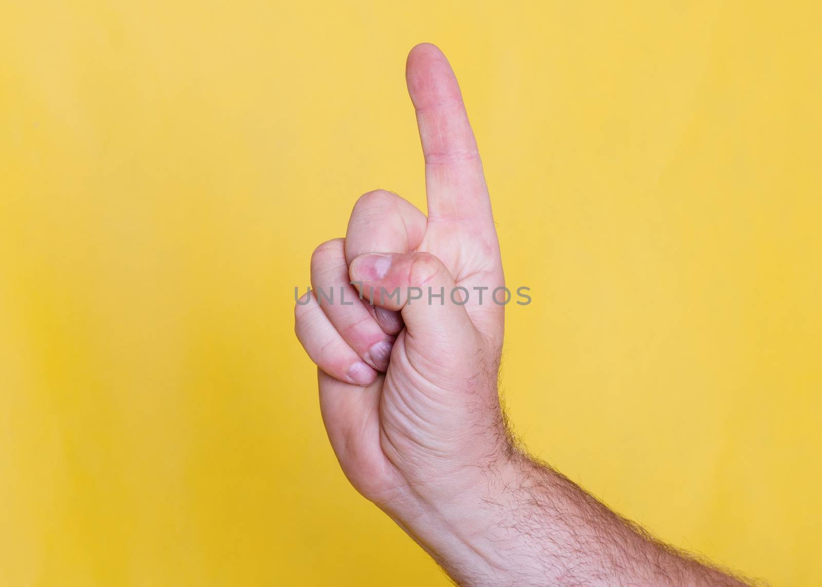 Man hand showing direction by one finger