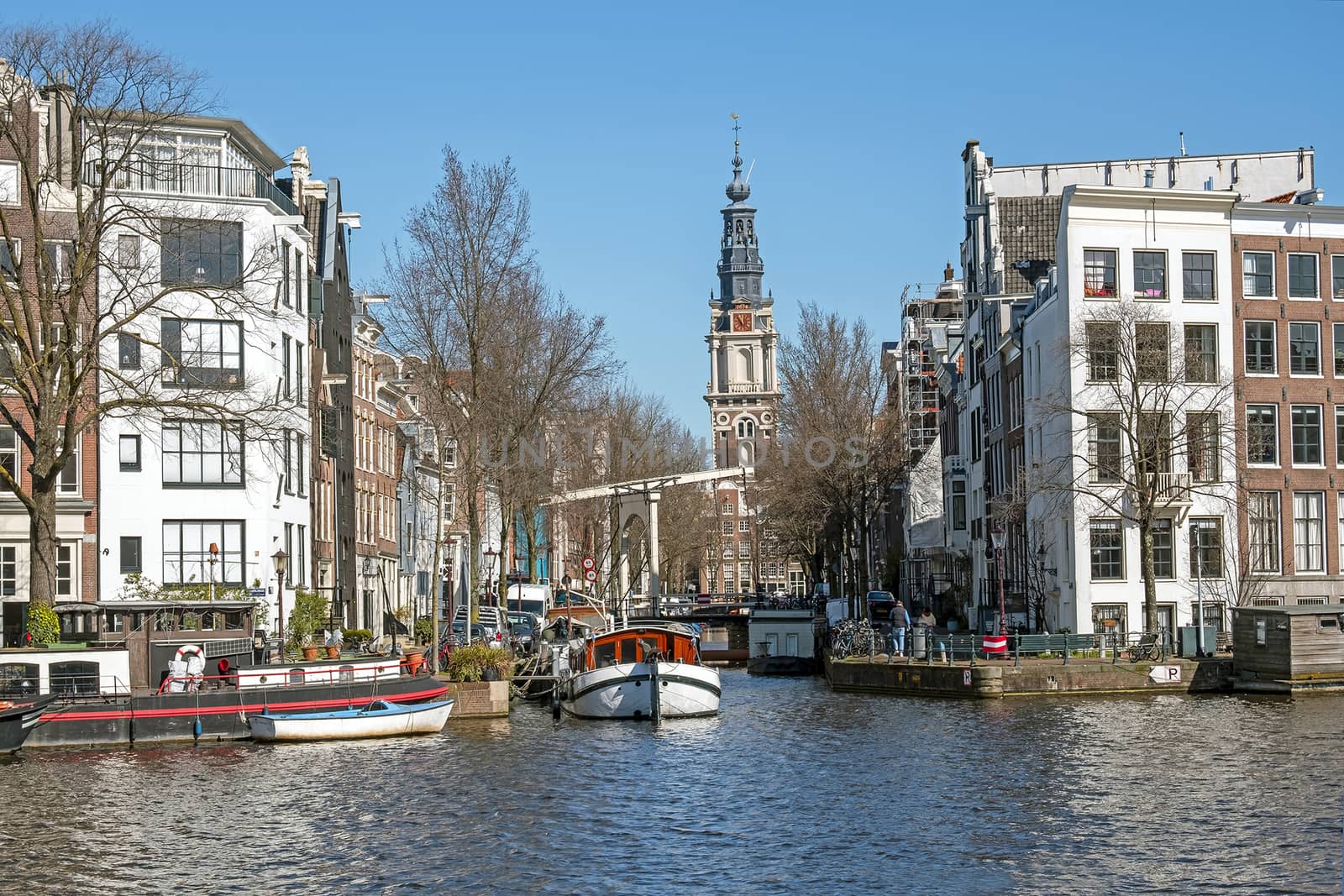 City scenic from Amsterdam with the South church in the Netherla by devy