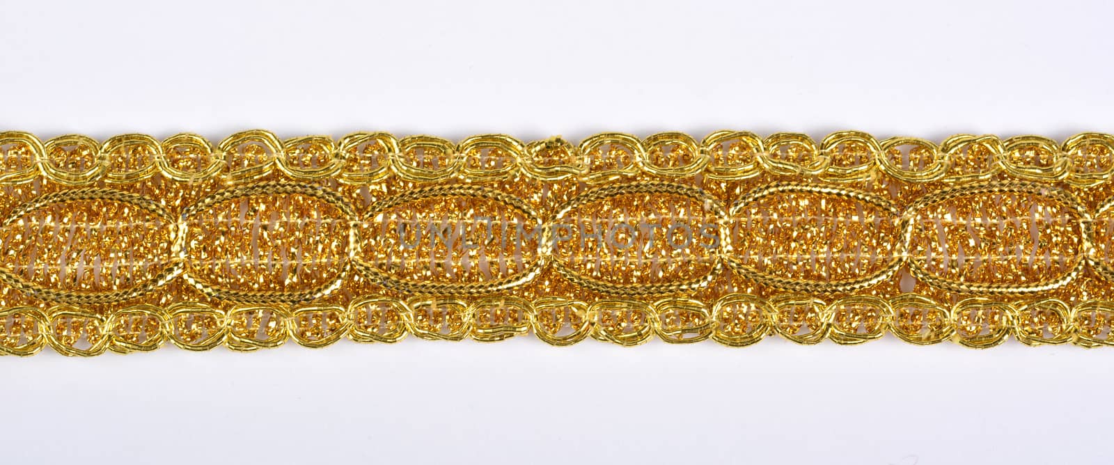 Braid lace made Luxury Metallic golden cord on white background by polyats