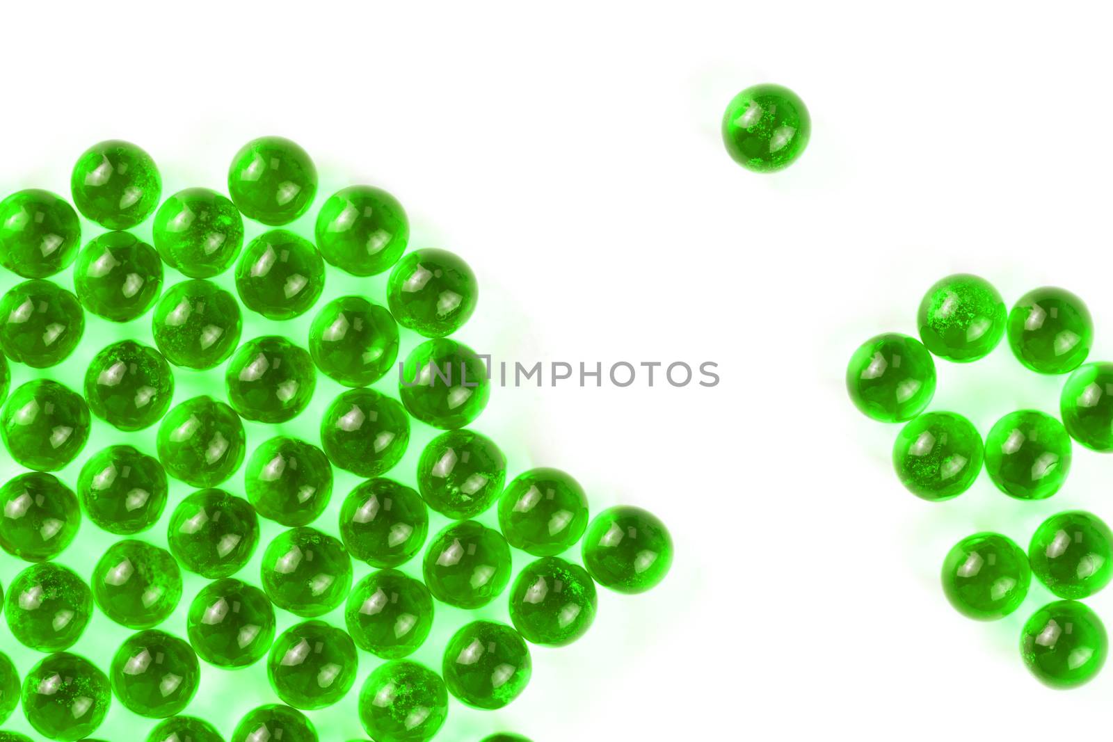 proton purple spherical ball capsules with selective focus isolated on white background.