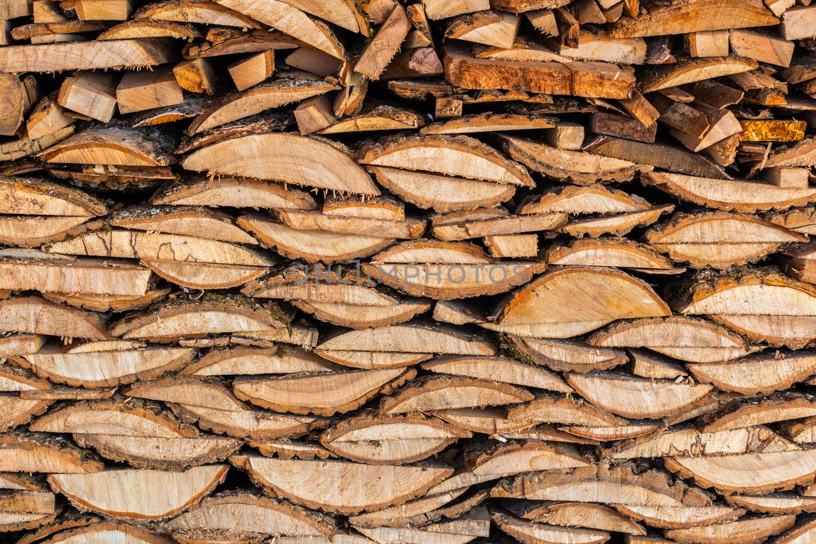 flat texture of firewood lumber leftovers stack.