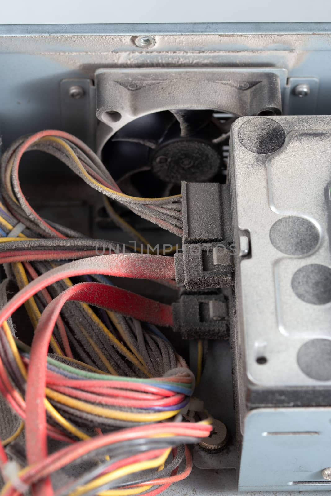 dusty pc electronic hardware closeup with selective focus and blur.