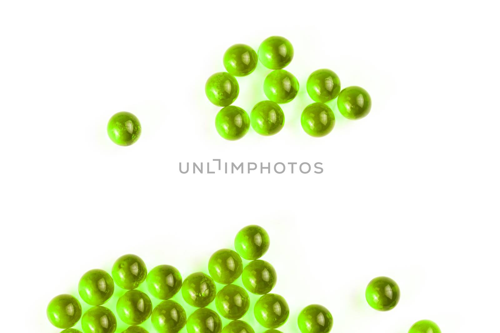 proton purple spherical ball capsules with selective focus isolated on white background.
