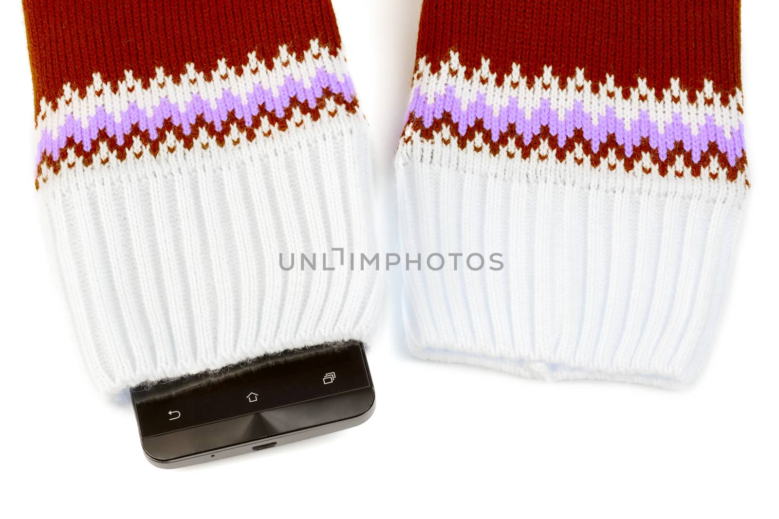 cellphone sticking out from knitted fabric like sweater or mittens by z1b