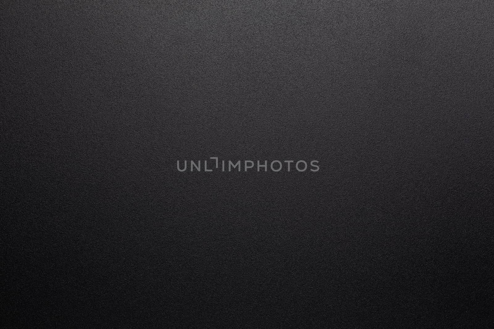 abstract black and white photo texture background of grainy powder coating surface.