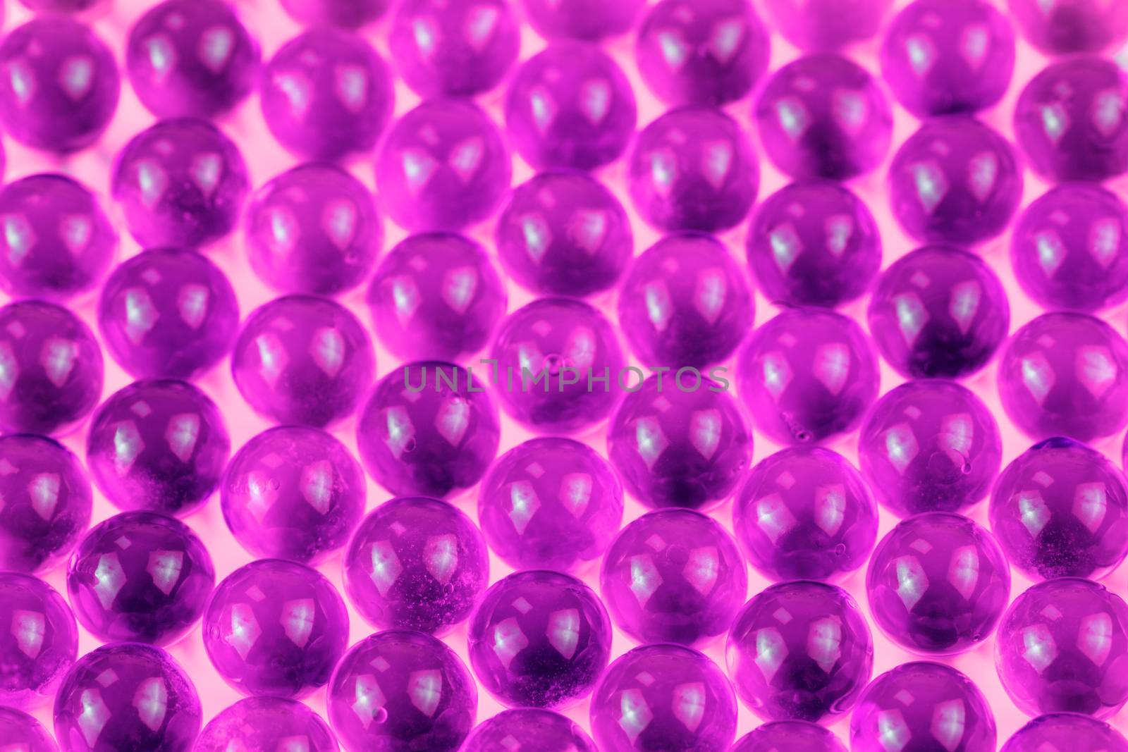 proton purple spherical ball capsules selective focus weird abstract background.