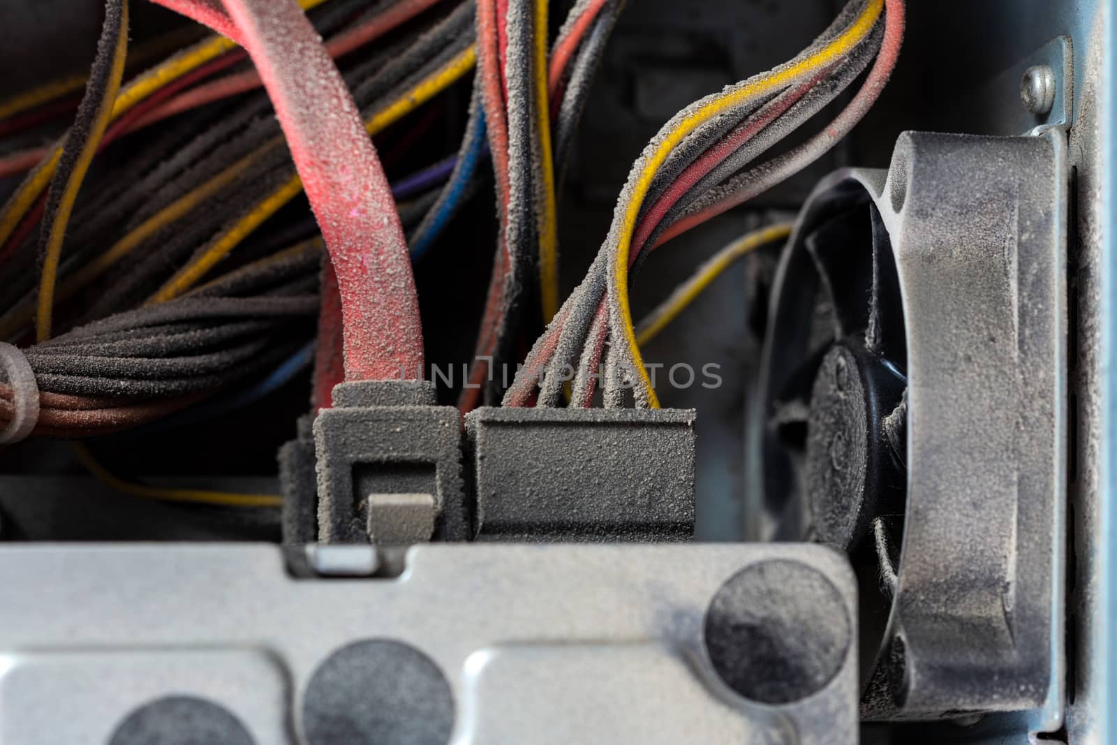 dusty pc electronic hardware closeup with selective focus and blur.