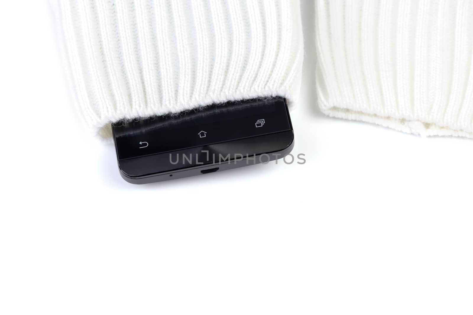 cellphone sticking out from knitted fabric like sweater or mittens by z1b