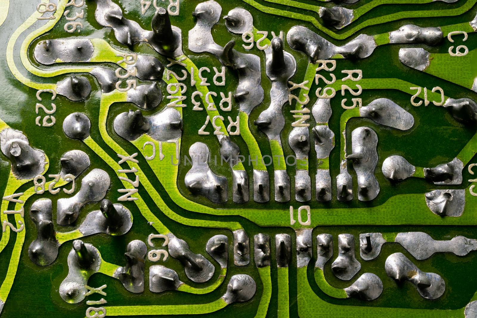 back side of old flat textolite pcb without components with selective focus
