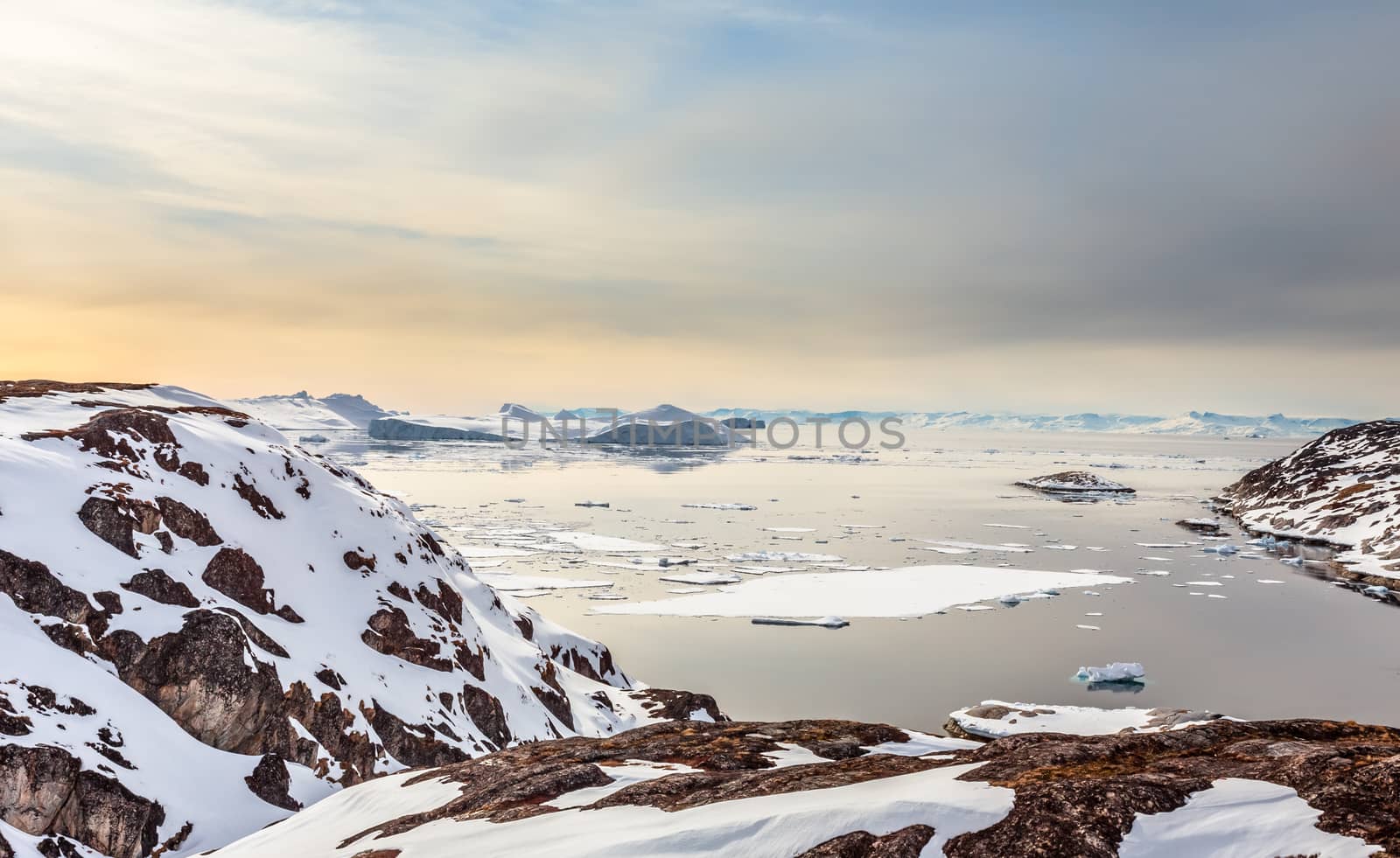 Ice fields and drifting Icebergs at the Ilulissat fjord, North Greenland