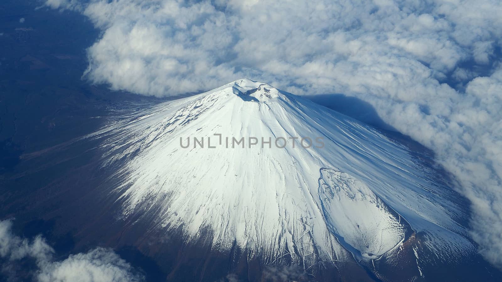 Top view angle of Mt. Fuji mountain and white snow  by gnepphoto