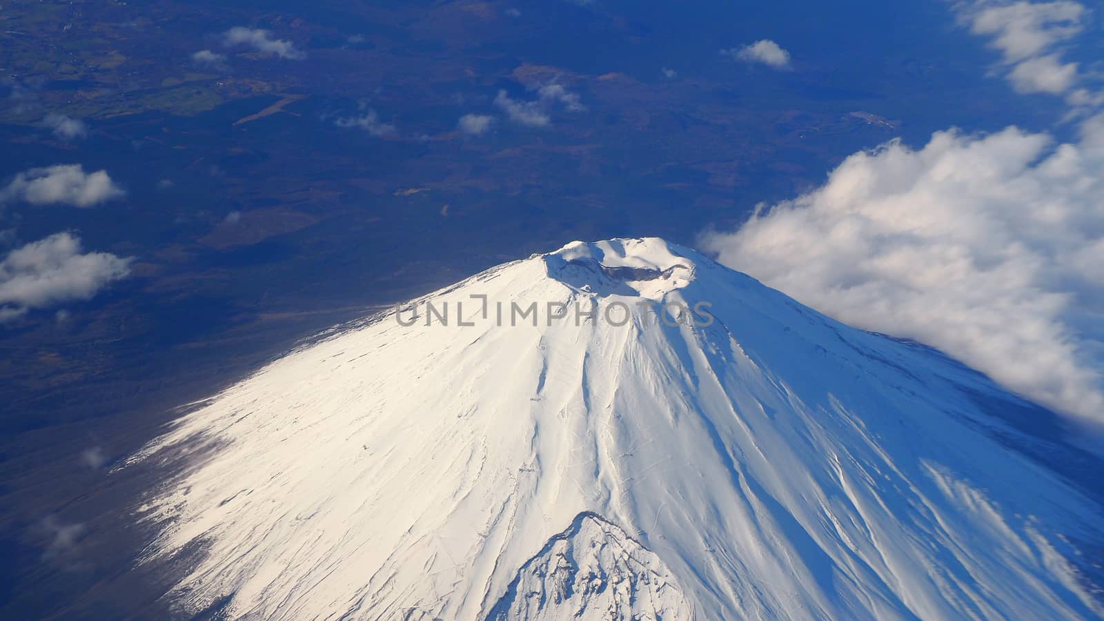 Top view angle of Mt. Fuji mountain and white snow  by gnepphoto