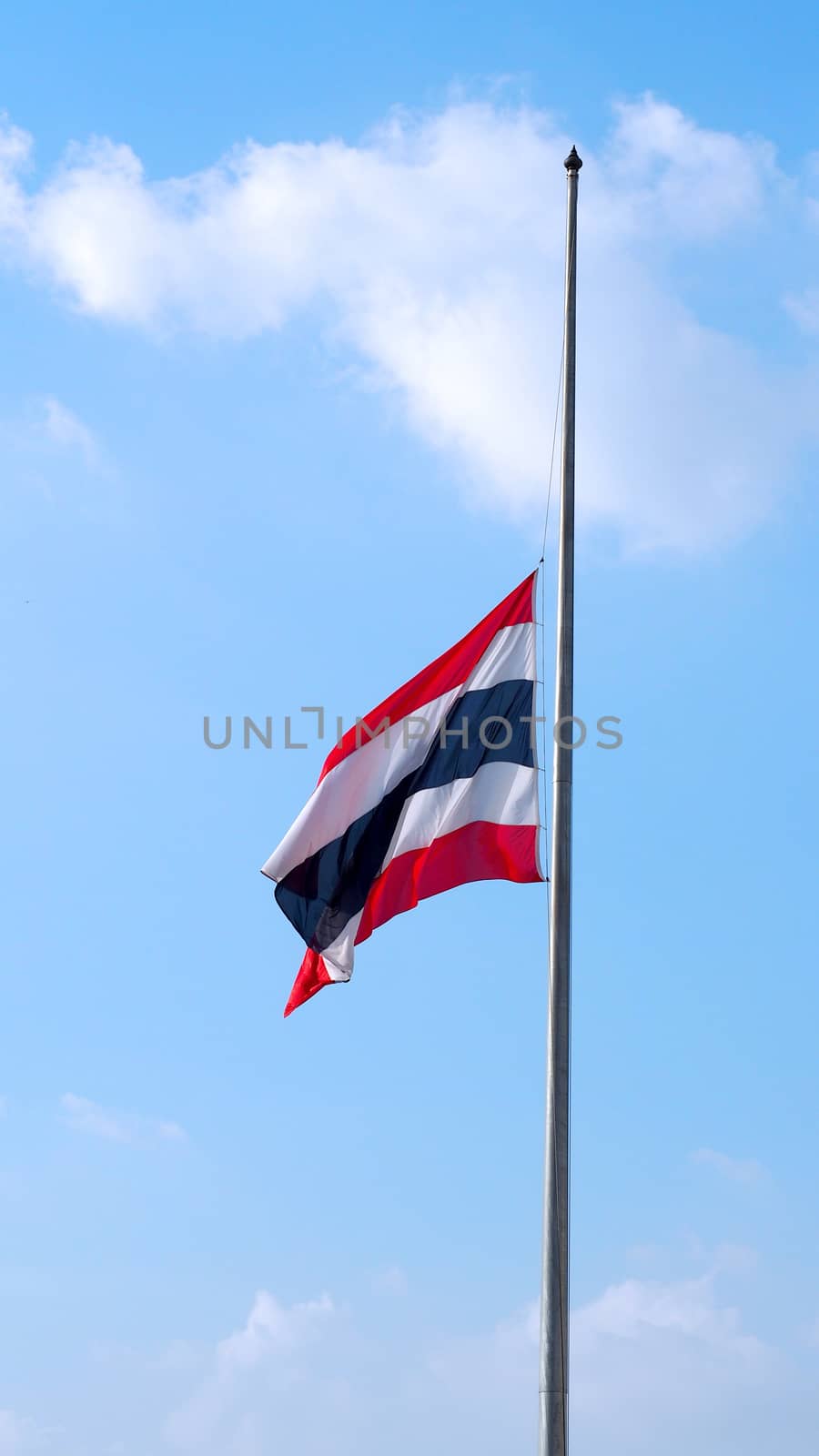 Thailand flag and clear blue sky. by gnepphoto