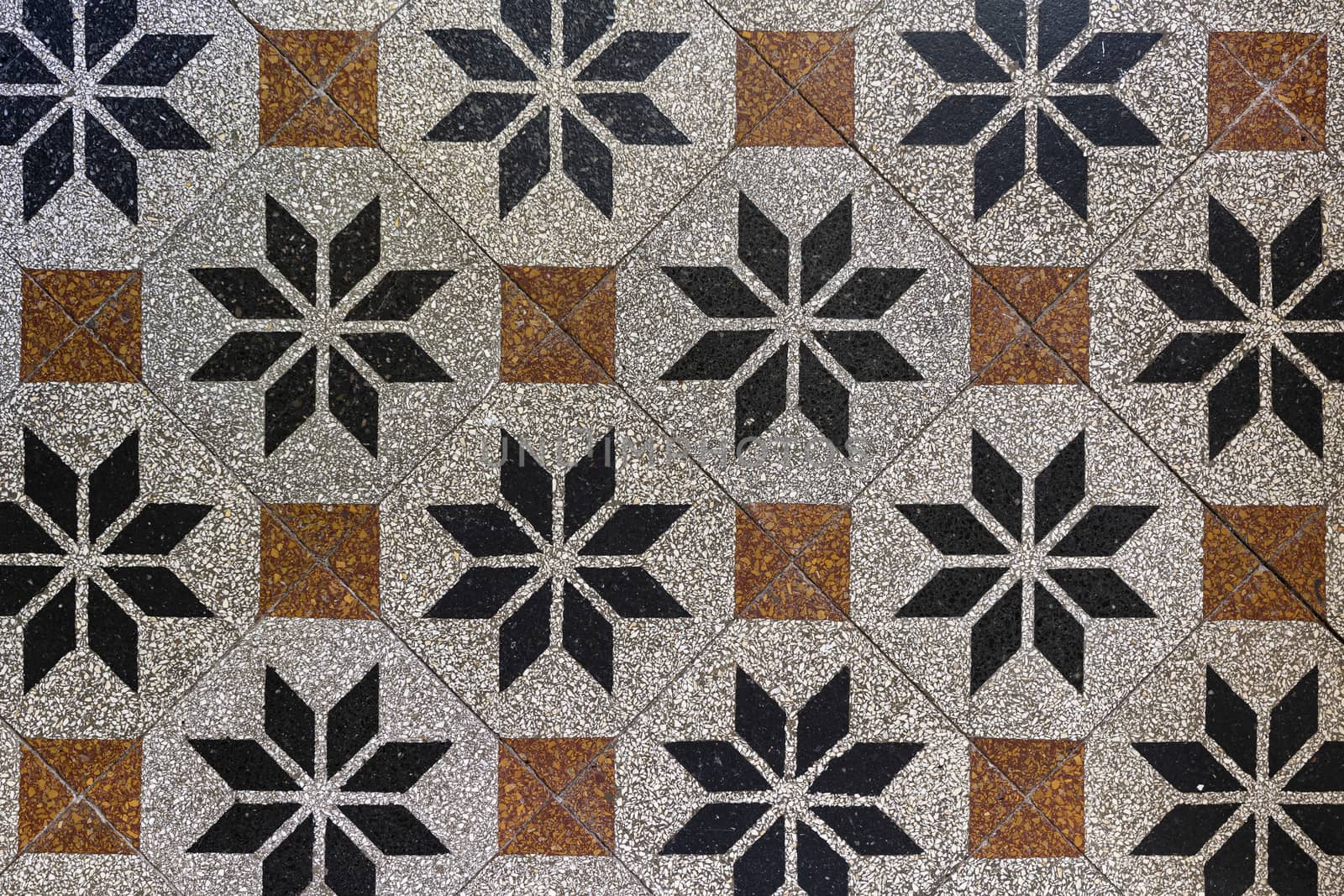 Old fashioned antique brown beige floor tiles by Tofotografie