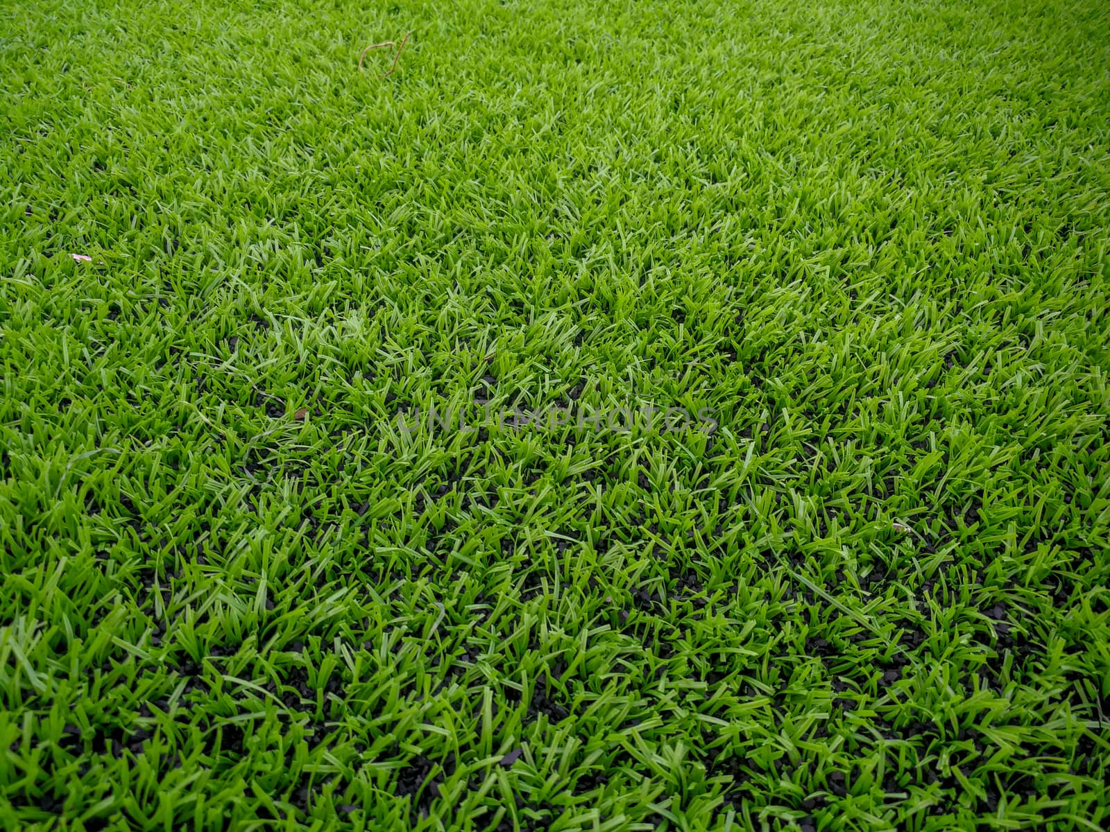 Football field, astro turf surface. Close up of throw in, kick off and corner area. Lushed green football pitch. by sonandonures
