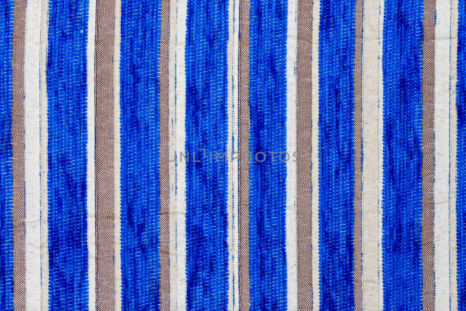 blue vertical striped synthetic woven upholstery fabric close-up texture and background