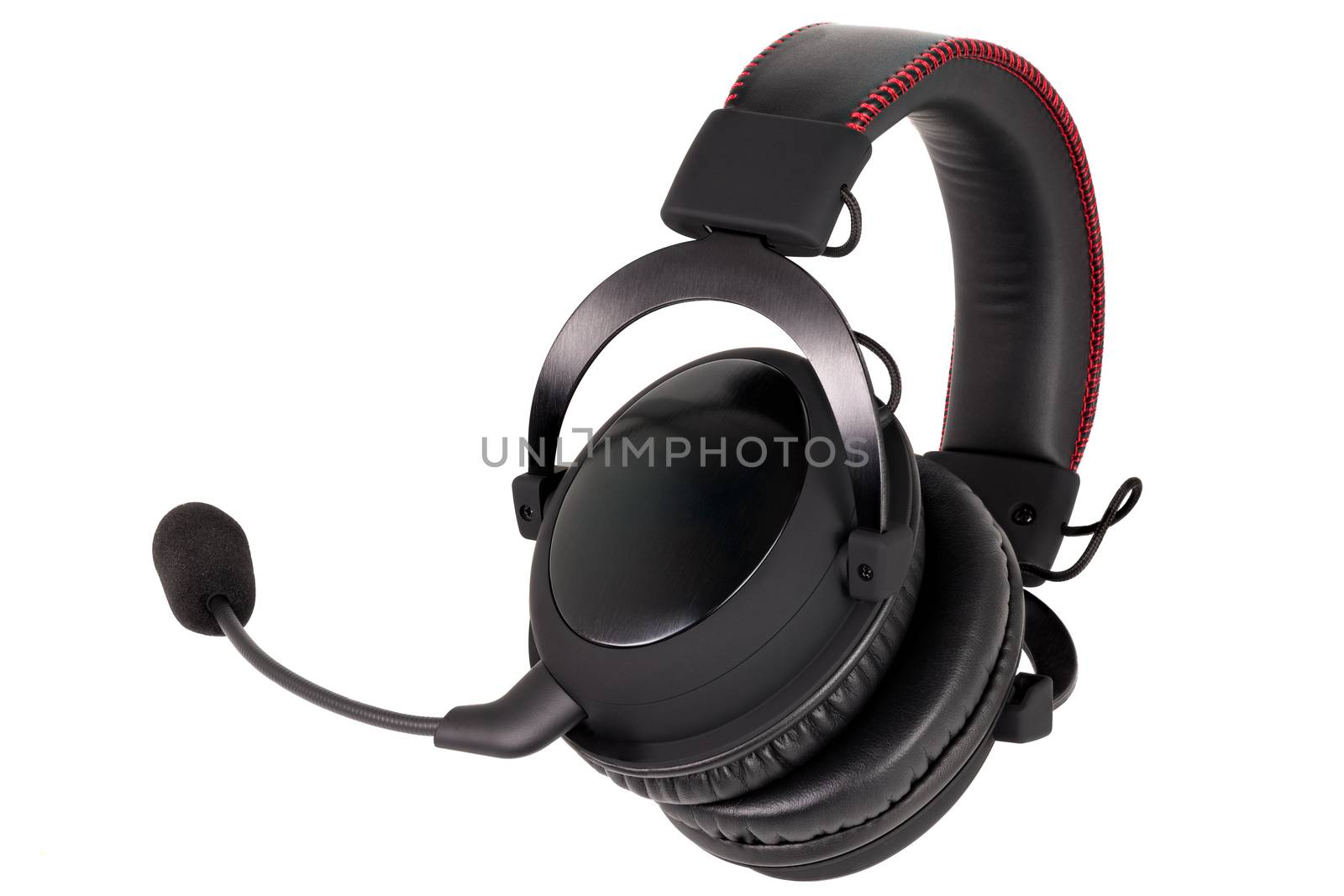 close view of wireless black gaming headphones with microphone isolated on white background.