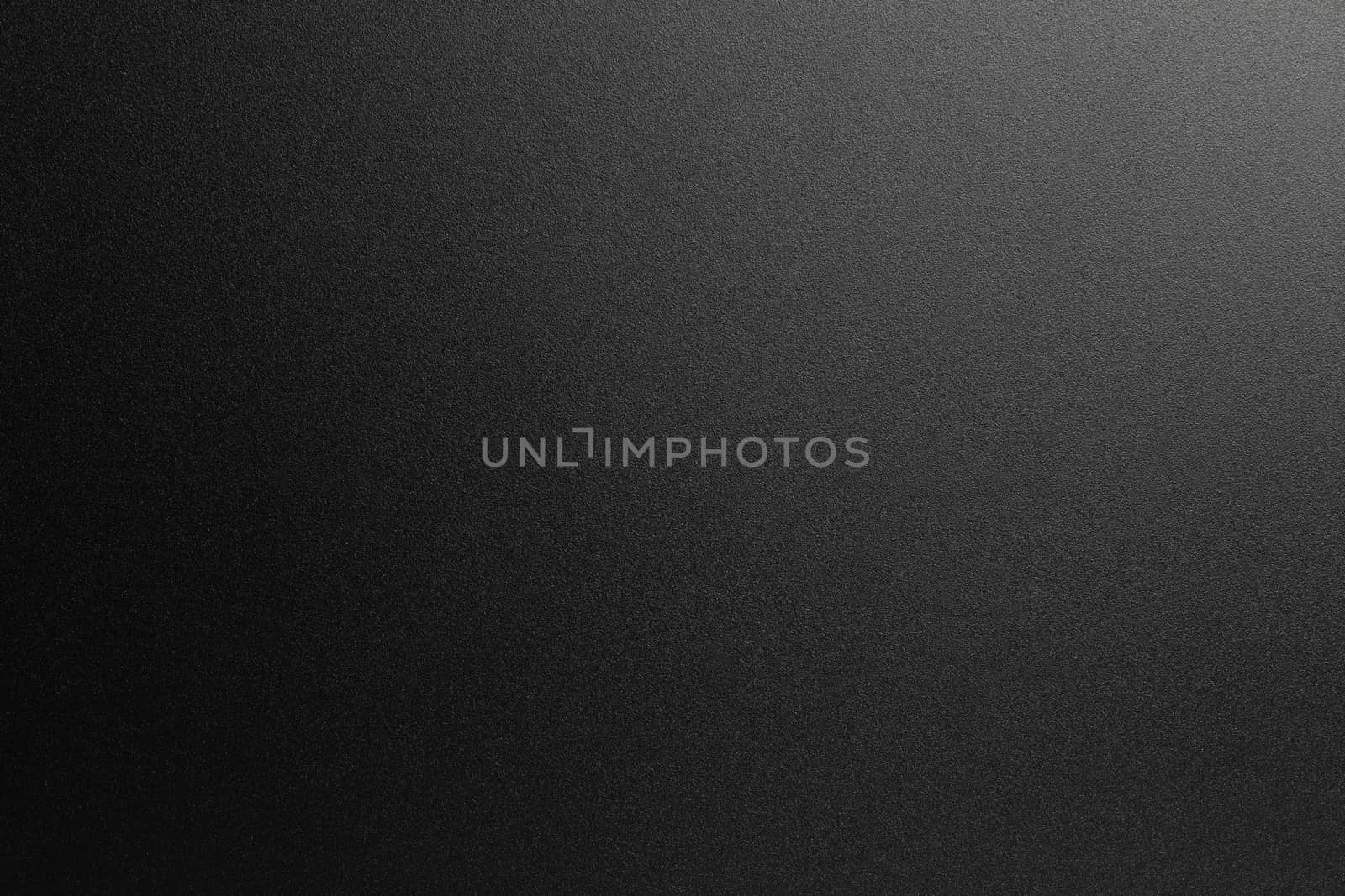 abstract black and white photo texture background of grainy powder coating surface.