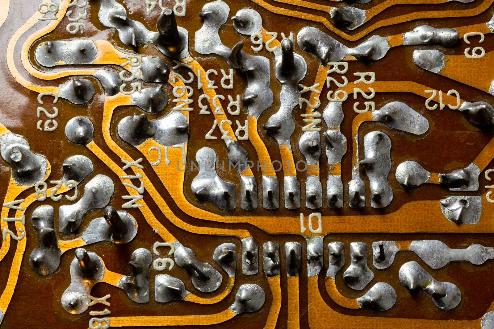 back side of old flat textolite pcb without components with selective focus