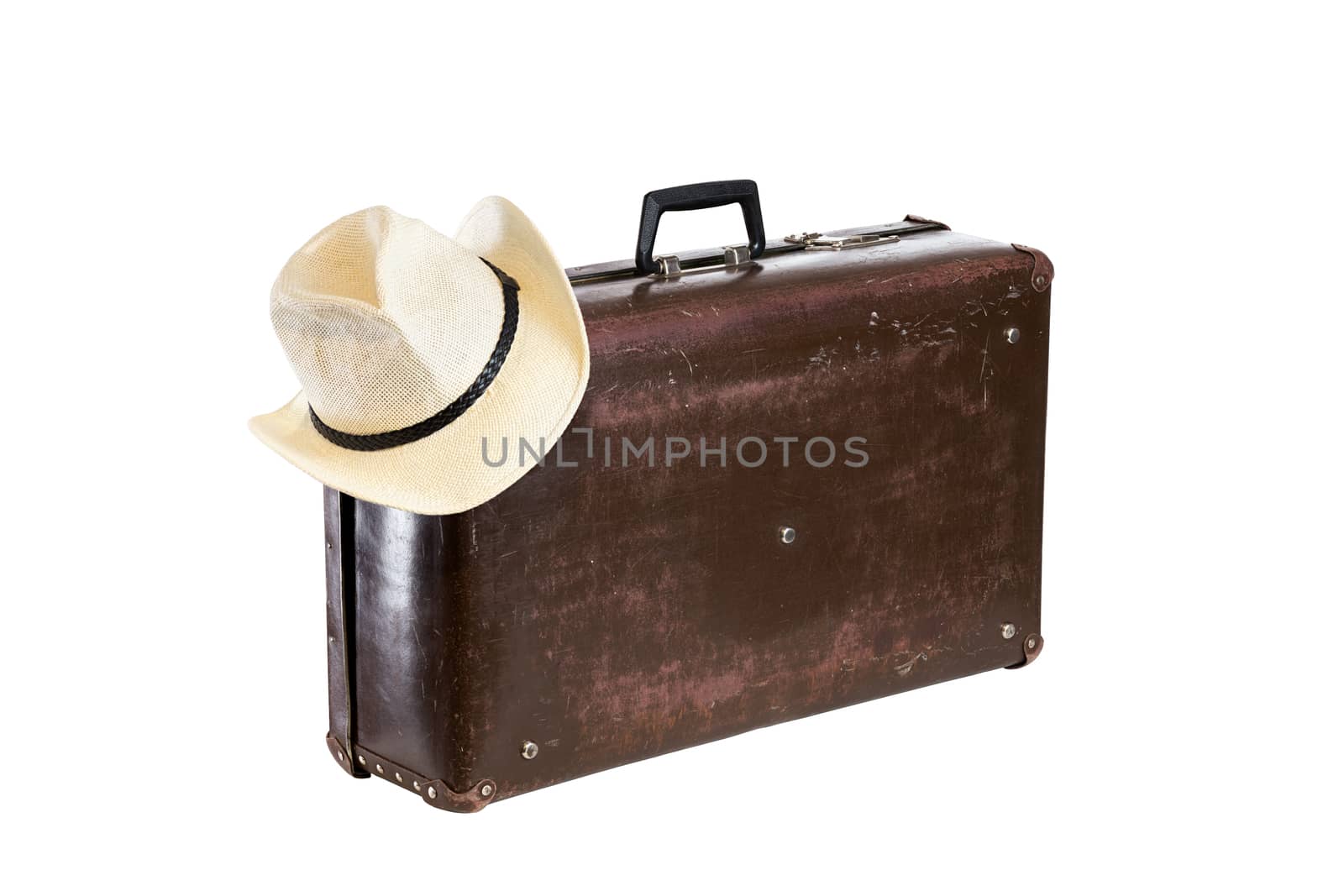 old brown fiber suitcase with hat isolated on white background by z1b
