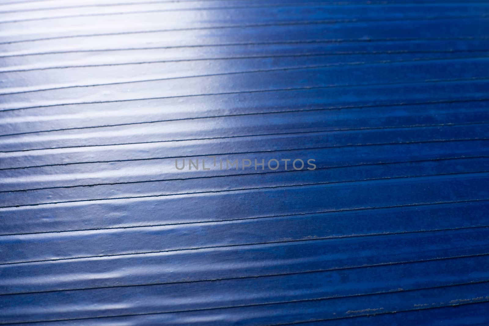 old blue pvc duct tape flat background with selective focus and shallow depth of field and natural optical blur