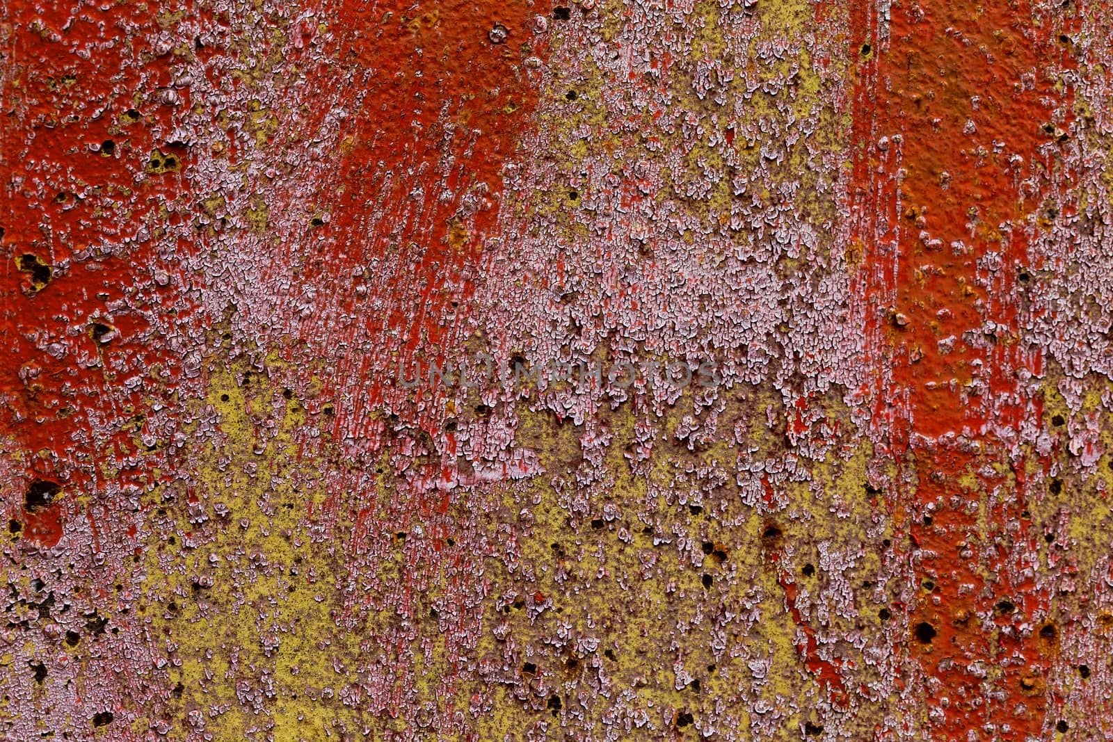 iron sheet with old red over white over green paint and lichen.